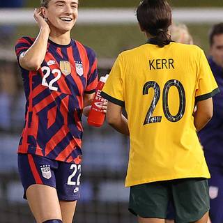 Kristie Mewis and Sam Kerr wallpaper