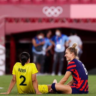 Kristie Mewis and Sam Kerr wallpaper