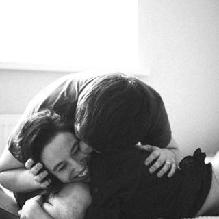 Boyfriend and girlfriend kisses wallpaper