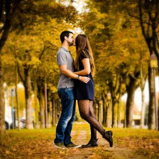 Boyfriend and girlfriend kisses wallpaper