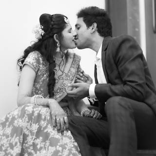 Boyfriend and girlfriend kisses wallpaper