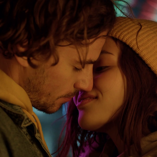 Boyfriend and girlfriend kisses wallpaper