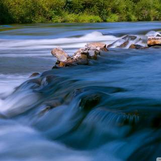 Flowing river wallpaper