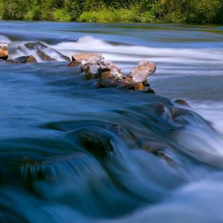 Flowing river wallpaper