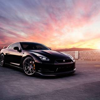 Car in sunset wallpaper