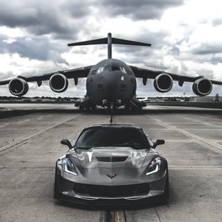 Car with plane wallpaper