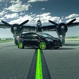 Car with plane wallpaper