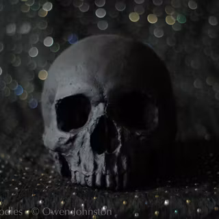 4k black skull wallpaper