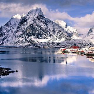 Mountain village winter 4k wallpaper