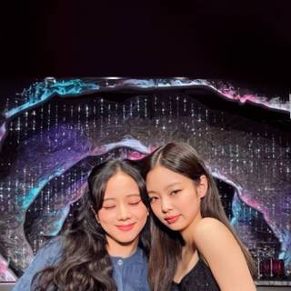 Jennie and Rose hug wallpaper