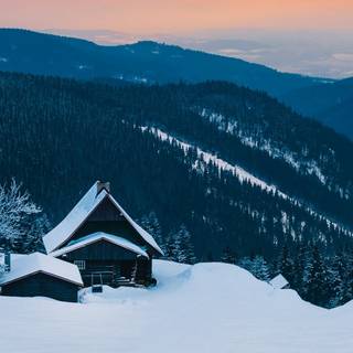 Winter mountain house wallpaper