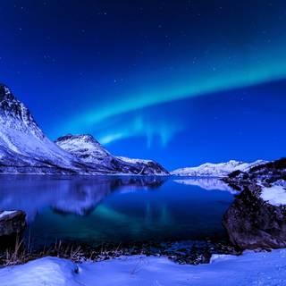 Winter night mountain lake wallpaper