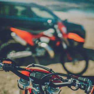 Bikes and cars together wallpaper