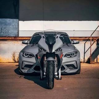 Bikes and cars together wallpaper