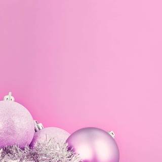 Pink Christmas ornaments wallpaper