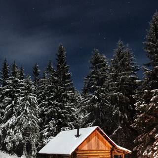 Wooden cabin winter wallpaper