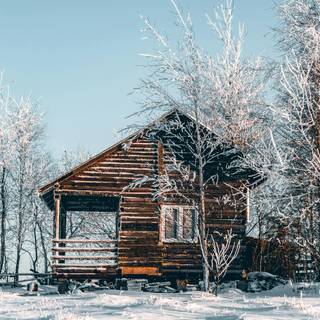 Wooden cabin winter wallpaper