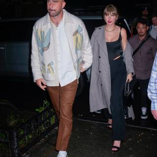 Taylor Swift and Travis Kelce wallpaper