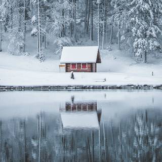 Winter lake cabin wallpaper