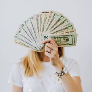 Girl with money wallpaper