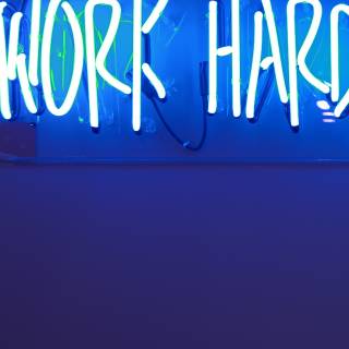 Neon work hard wallpaper