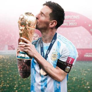 Lionel Messi Kissing the World Cup trophy wallpaper