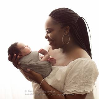 Mother and new born baby wallpaper