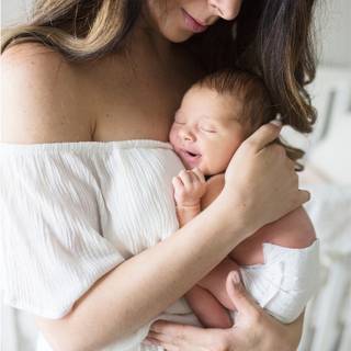 Mother and new born baby wallpaper