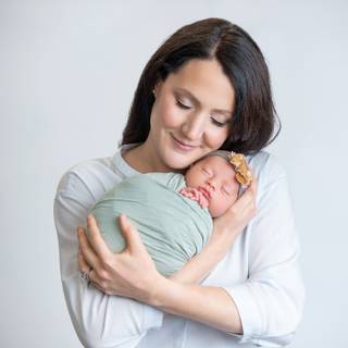 Mother and new born baby wallpaper