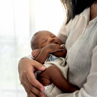 Mother and new born baby wallpaper