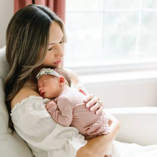 Mother and new born baby wallpaper