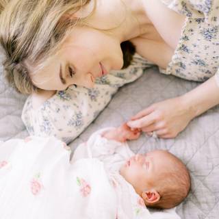 Mother and new born baby wallpaper