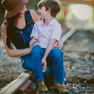 Mother and son 4k wallpaper