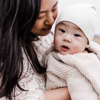 Mother and new born baby wallpaper