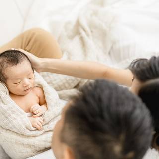 Mother and new born baby wallpaper