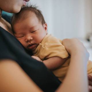 Mother and new born baby wallpaper