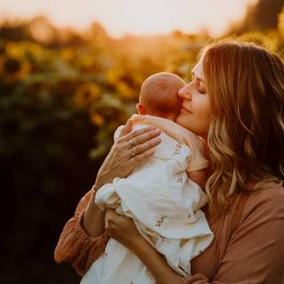 Mother and new born baby wallpaper