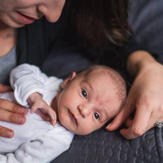 Mother and new born baby wallpaper