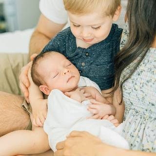 Mother and new born baby wallpaper