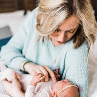 Mother and new born baby wallpaper