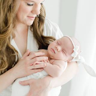 Mother and new born baby wallpaper