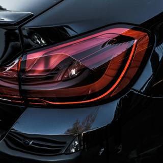 Red and black car 4k wallpaper