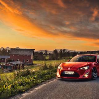 Car in sunset wallpaper