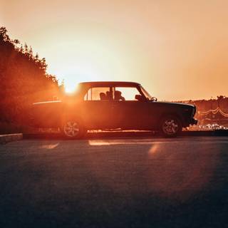 Car sunset 4k wallpaper
