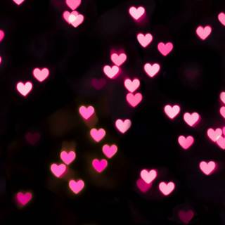 Glowing hearts wallpaper