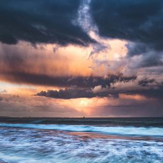 Stormy beach wallpaper