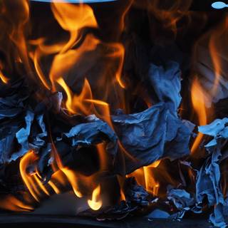 Burning paper wallpaper
