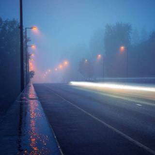 Rainy highway iPhone wallpaper