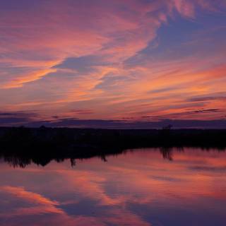 Reflecting sky and sunset wallpaper