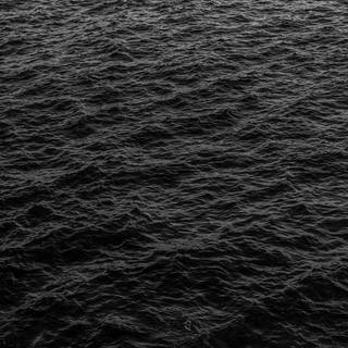 Liquid black wallpaper